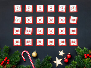 Julekalender med tall fra 1 til 24 på en julete bakgrunn.